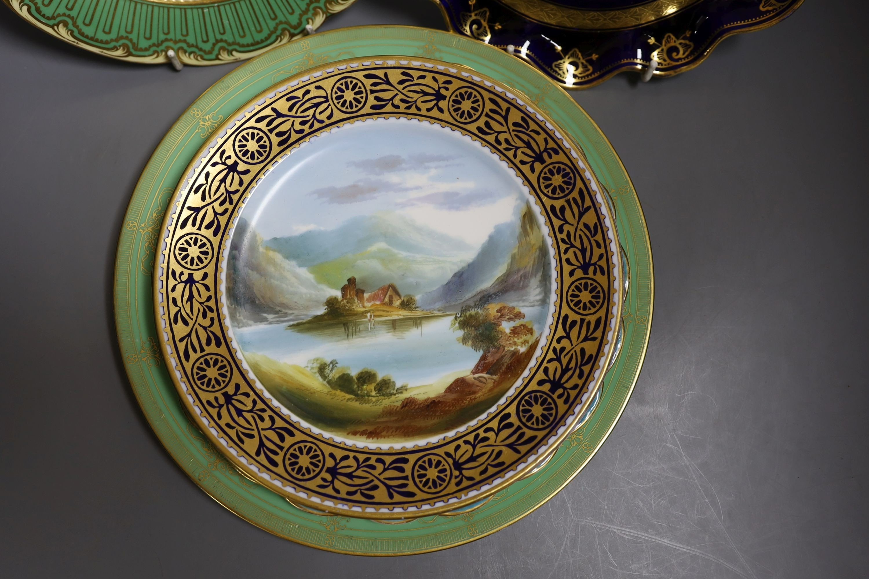 Four English porcelain topographical painted plates, to include Coalport, Royal Worcester and a similar (5)